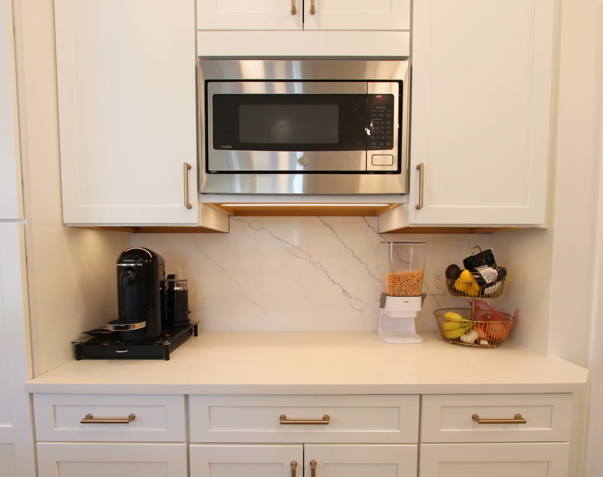 Philadelphia kitchen remodel with blue and cream cabinetry, a coffee bar and large windows