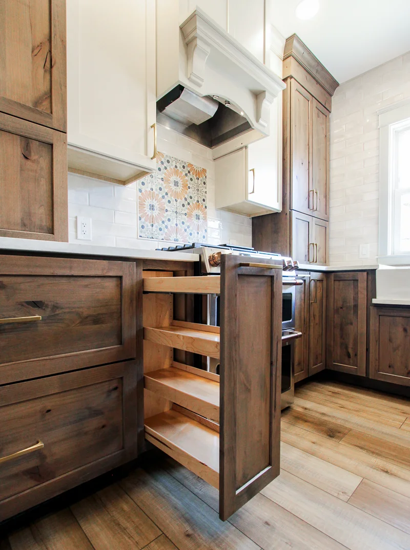 Custom pull-out kitchen cabinet storage detail by dRemodeling