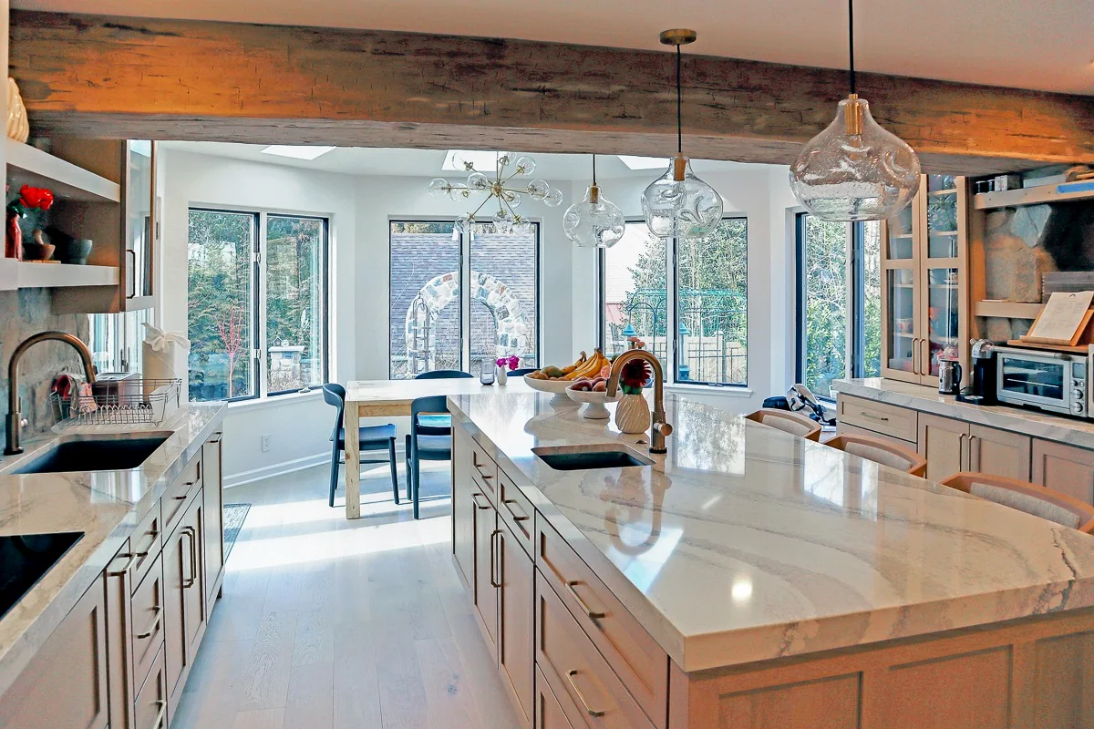 Open-concept kitchen after remodeling in Newtown Square by dRemodeling.